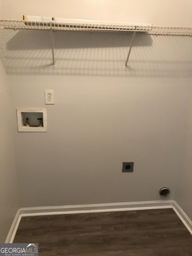 clothes washing area with laundry area, washer hookup, hookup for an electric dryer, baseboards, and dark wood-style floors