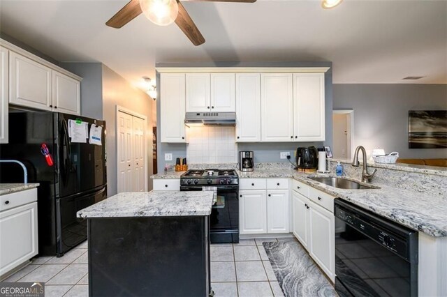 2759 Beddington Way, Suwanee, GA 30024 - kitchen featuring black appliances, a sink, under cabinet range hood, a ceiling fan, and a peninsula