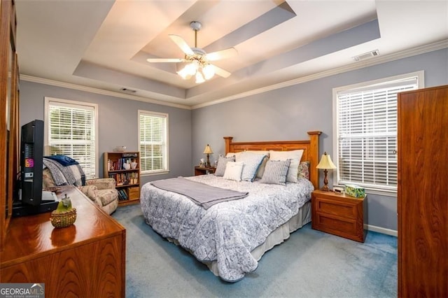 2759 Beddington Way, Suwanee, GA 30024 - carpeted bedroom with a raised ceiling, ceiling fan, ornamental molding, and baseboards