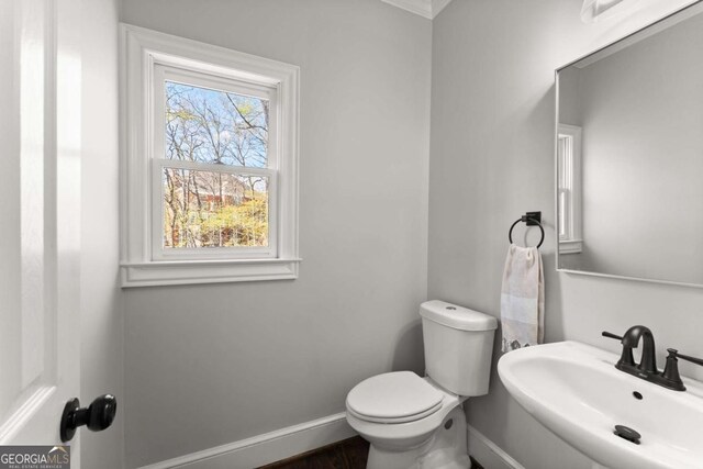3498 Westhampton Way, Gainesville, GA 30506 - bathroom featuring baseboards, toilet, and a sink