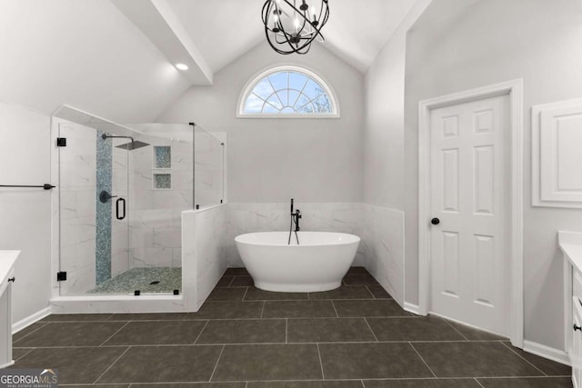 3498 Westhampton Way, Gainesville, GA 30506 - bathroom with lofted ceiling, vanity, a marble finish shower, tile patterned floors, and a soaking tub