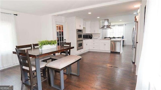 2638 Cleburne Pkwy, Powder Springs, GA 30127 - dining space with dark wood finished floors, recessed lighting, and visible vents