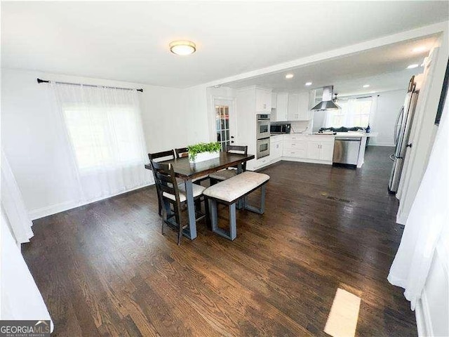 2638 Cleburne Pkwy, Powder Springs, GA 30127 - dining space with baseboards, recessed lighting, and dark wood-style floors