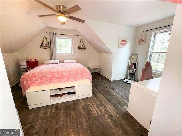 2638 Cleburne Pkwy, Powder Springs, GA 30127 - bedroom with baseboards, vaulted ceiling, a ceiling fan, and wood finished floors