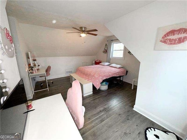2638 Cleburne Pkwy, Powder Springs, GA 30127 - bedroom with a ceiling fan, baseboards, visible vents, vaulted ceiling, and wood finished floors