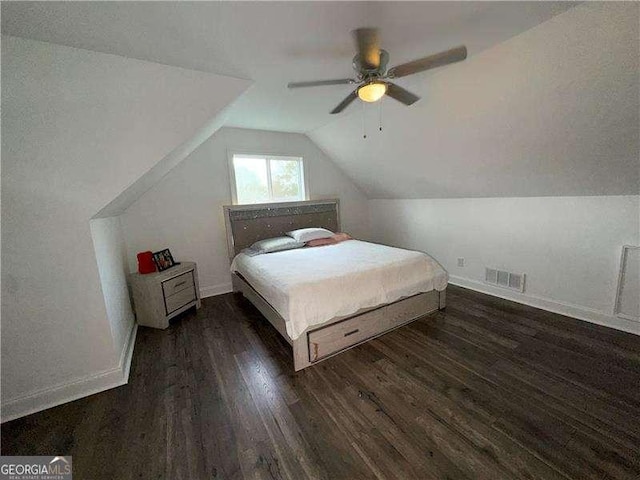 2638 Cleburne Pkwy, Powder Springs, GA 30127 - bedroom featuring a ceiling fan, dark wood-type flooring, baseboards, visible vents, and vaulted ceiling