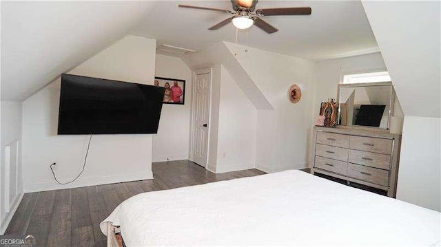 2638 Cleburne Pkwy, Powder Springs, GA 30127 - bedroom featuring vaulted ceiling, baseboards, a ceiling fan, and wood finished floors