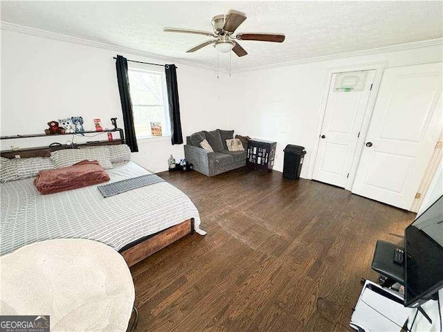 2638 Cleburne Pkwy, Powder Springs, GA 30127 - bedroom with a textured ceiling, wood finished floors, a ceiling fan, and ornamental molding