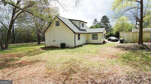 2638 Cleburne Pkwy, Powder Springs, GA 30127 - rear view of property with a lawn