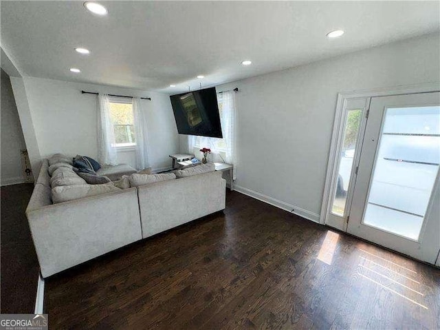 2638 Cleburne Pkwy, Powder Springs, GA 30127 - living area with dark wood finished floors, baseboards, and recessed lighting