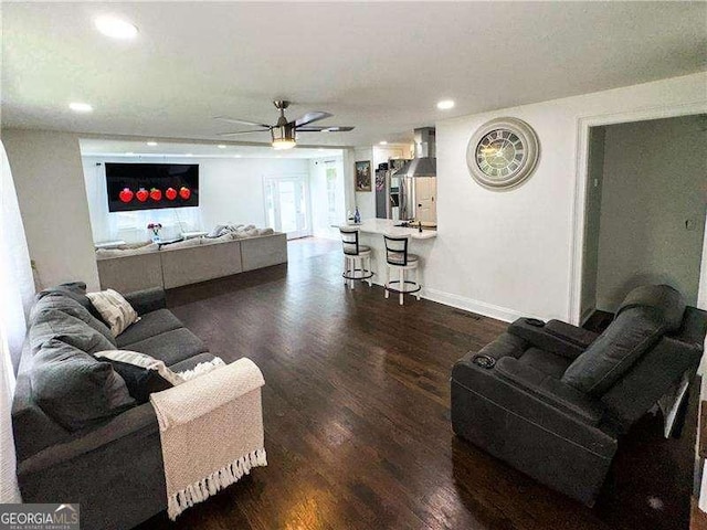 2638 Cleburne Pkwy, Powder Springs, GA 30127 - living area featuring baseboards, wood finished floors, a ceiling fan, and recessed lighting