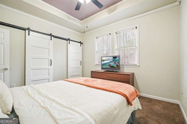 2232 Burnt Mountain Rd, Jasper, GA 30143 - carpeted bedroom with ornamental molding, a barn door, ceiling fan, a raised ceiling, and baseboards