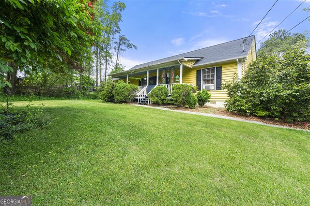 4720 Bill Cheek Rd, Auburn, GA 30011 - view of front of house with a front lawn, a porch, and crawl space