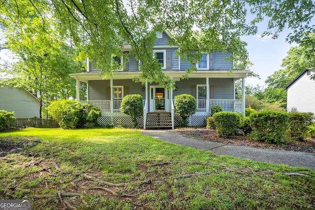 view of front facade with a porch and a front yard