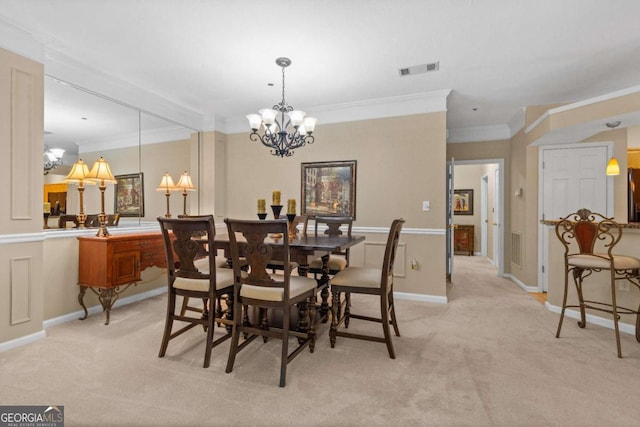 1127 Whitshire Way Unit 1127, Alpharetta, GA 30004 - dining area featuring a chandelier, crown molding, and light colored carpet