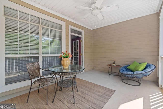 view of patio / terrace with ceiling fan and outdoor dining area