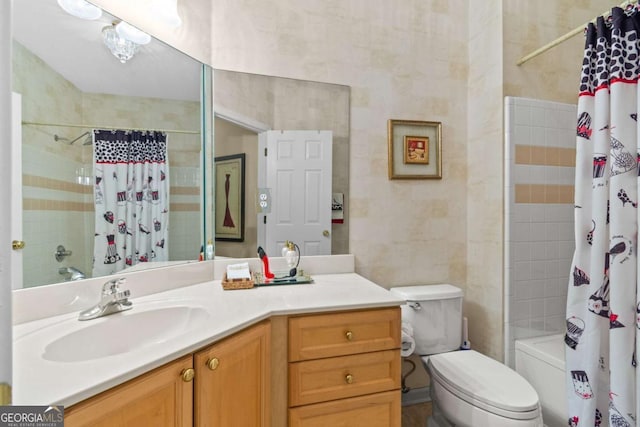 bathroom featuring vanity, toilet, and shower / bathtub combination with curtain