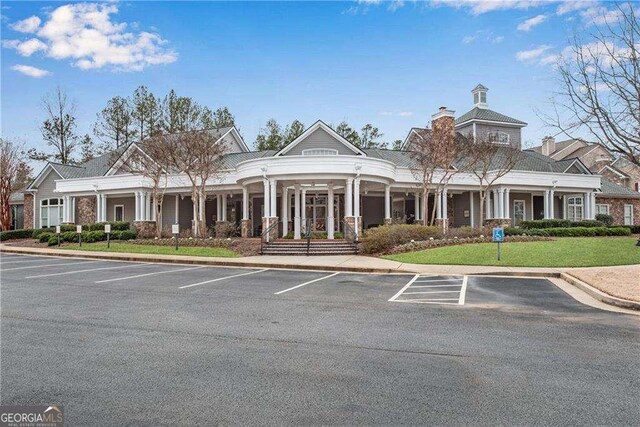 1127 Whitshire Way Unit 1127, Alpharetta, GA 30004 - view of property with uncovered parking