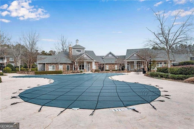 community pool with a patio