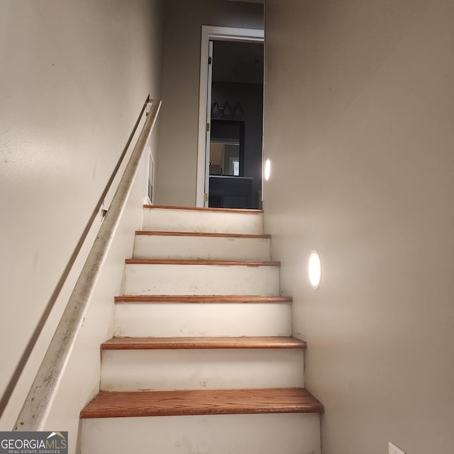 staircase with visible vents