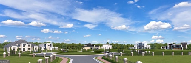 view of property's community featuring a lawn