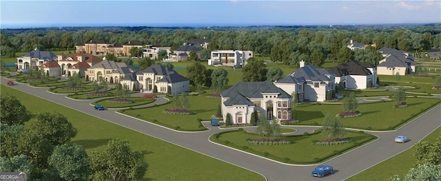 aerial view featuring a wooded view and a residential view