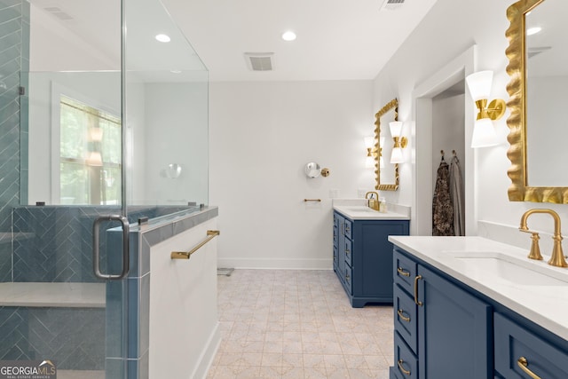 bathroom featuring a sink, two vanities, a stall shower, and visible vents