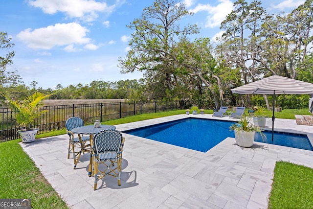 view of pool featuring fence, a patio, and a fenced in pool