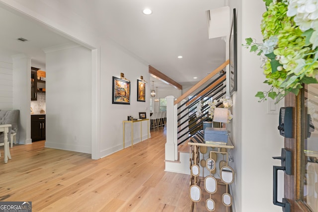 foyer featuring light wood-type flooring, visible vents, recessed lighting, stairway, and baseboards