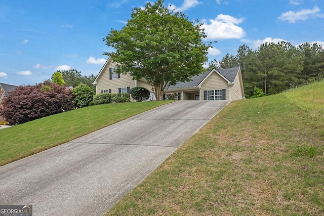 6345 Aarons Way, Flowery Branch, GA 30542 - view of front of home featuring a front lawn, driveway, and a carport