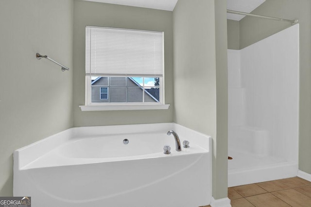 6345 Aarons Way, Flowery Branch, GA 30542 - full bathroom featuring tile patterned floors, a bath, and a walk in shower