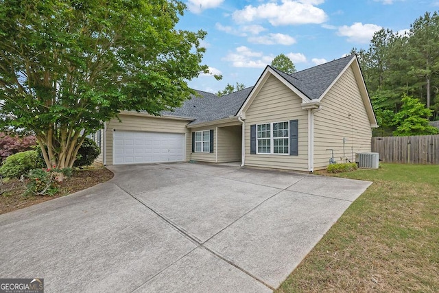 6345 Aarons Way, Flowery Branch, GA 30542 - ranch-style home featuring fence, an attached garage, central AC, concrete driveway, and a front lawn