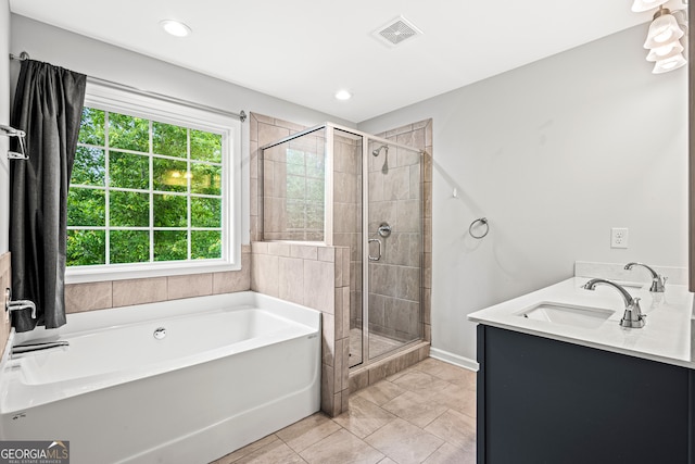 126 Ashton Pl, Newnan, GA 30265 - full bathroom featuring recessed lighting, visible vents, a bath, a sink, and a shower stall