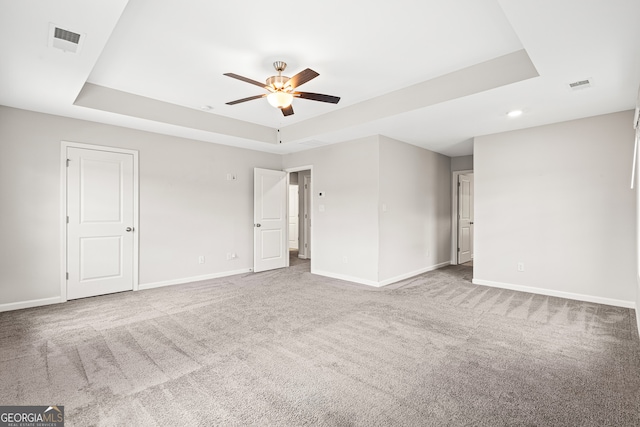 126 Ashton Pl, Newnan, GA 30265 - interior space with a raised ceiling, carpet, baseboards, and visible vents