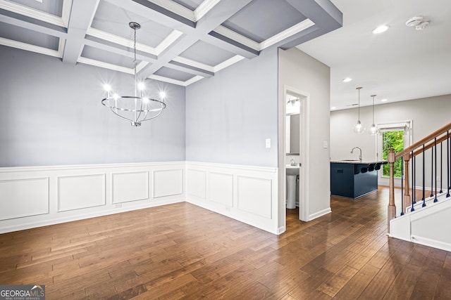 126 Ashton Pl, Newnan, GA 30265 - unfurnished dining area with a sink, stairs, dark wood-type flooring, an inviting chandelier, and beamed ceiling