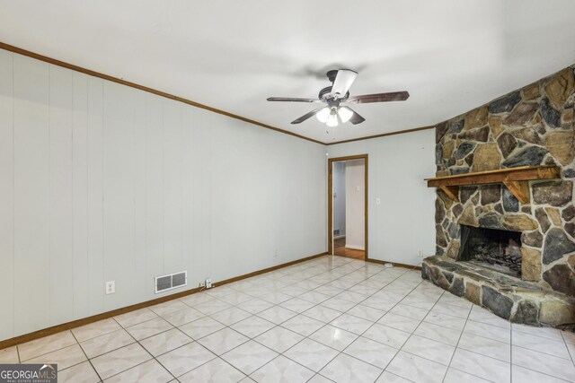 4074 Idlevale Dr, Tucker, GA 30084 - unfurnished living room featuring visible vents, a fireplace, crown molding, a ceiling fan, and baseboards