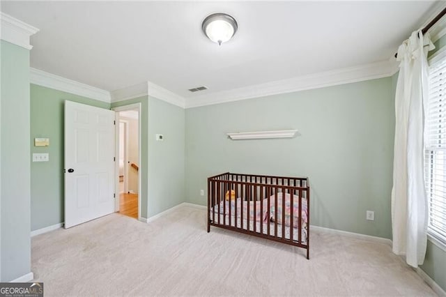 bedroom featuring carpet floors, crown molding, multiple windows, and baseboards