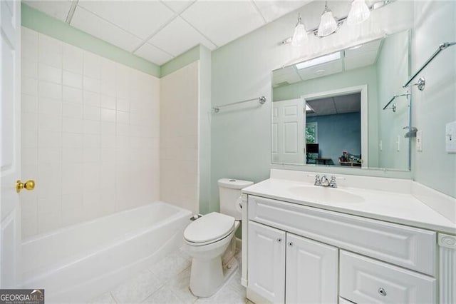 full bath featuring toilet, vanity, tile patterned floors, and  shower combination