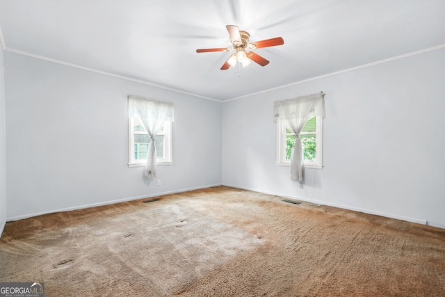 119 Blount St, Forsyth, GA 31029 - carpeted spare room with ornamental molding, healthy amount of natural light, and ceiling fan
