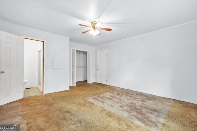 119 Blount St, Forsyth, GA 31029 - unfurnished bedroom with carpet floors, ensuite bath, and ceiling fan