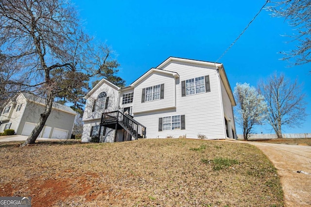 7760 Poppy Dr, Winston, GA 30187 - view of front of property with a front lawn and a garage