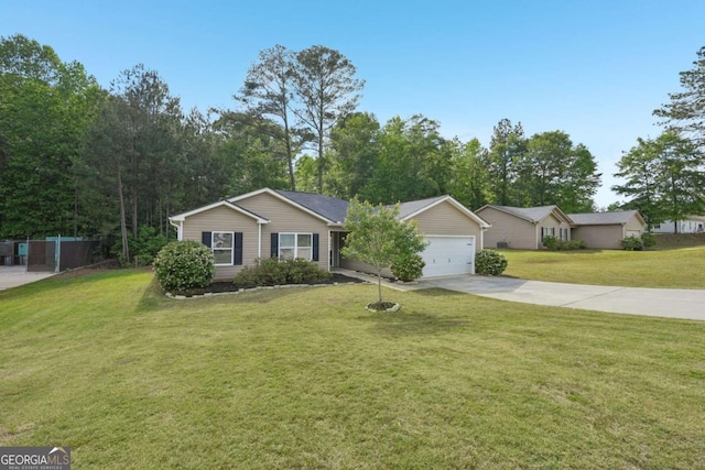 single story home with concrete driveway, fence, and a front lawn