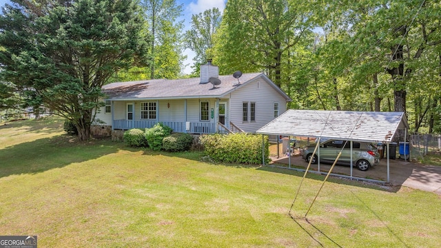 303 Jennys Cove Rd, Cleveland, GA 30528 - view of front facade with covered porch, driveway, a chimney, and a front yard
