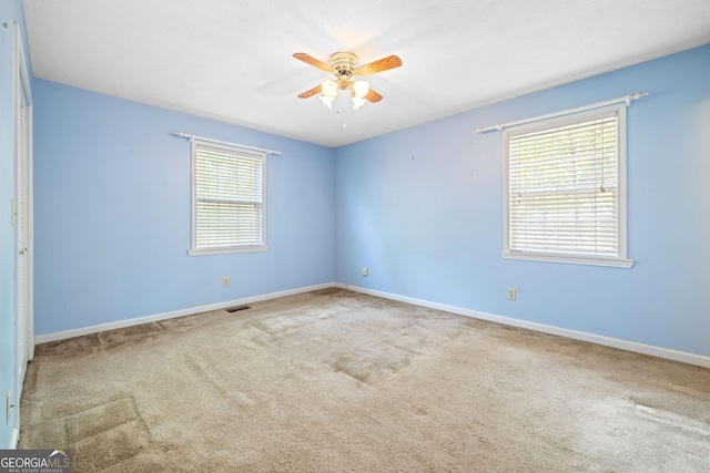 303 Jennys Cove Rd, Cleveland, GA 30528 - empty room featuring baseboards, carpet floors, a ceiling fan, and visible vents