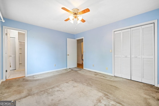303 Jennys Cove Rd, Cleveland, GA 30528 - unfurnished bedroom with carpet, connected bathroom, a ceiling fan, a closet, and baseboards