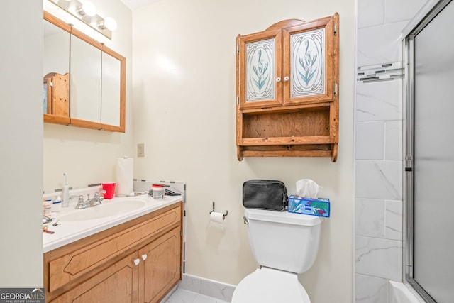 303 Jennys Cove Rd, Cleveland, GA 30528 - full bathroom featuring toilet, marble finish floor, vanity, an enclosed shower, and baseboards