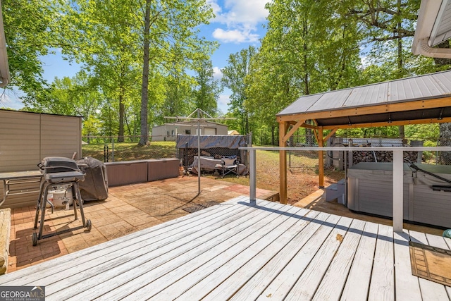 303 Jennys Cove Rd, Cleveland, GA 30528 - wooden deck featuring a hot tub, a gazebo, a fenced backyard, and a patio