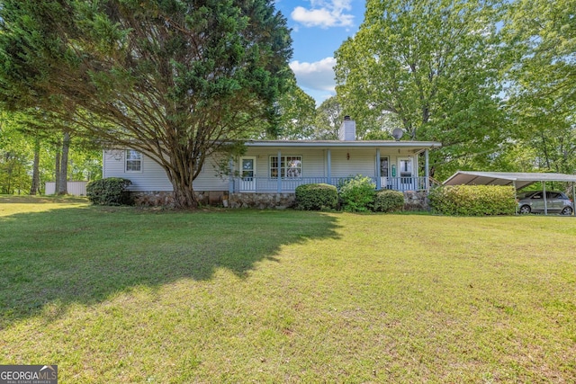 303 Jennys Cove Rd, Cleveland, GA 30528 - back of house with a porch, a carport, a chimney, and a lawn