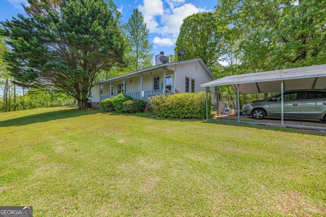 303 Jennys Cove Rd, Cleveland, GA 30528 - exterior space featuring covered porch and a carport