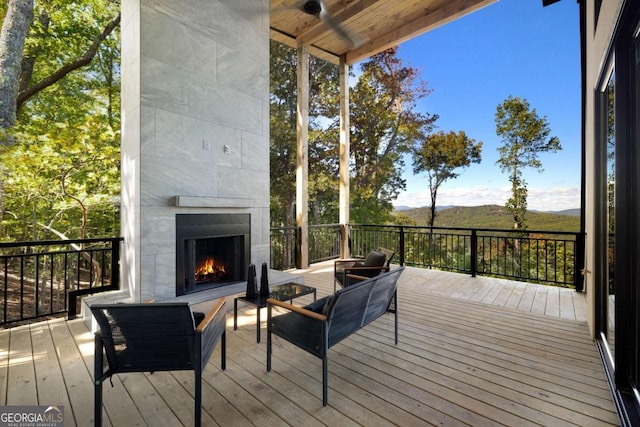 714 Scouts Overlook, Morganton, GA 30560 - deck with an outdoor living space with a fireplace